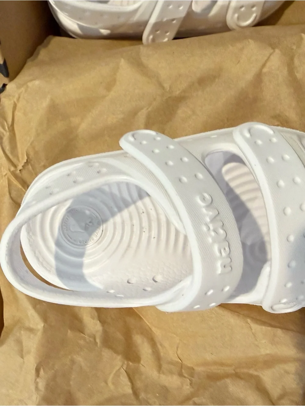 Native toddler sandals in Shell White